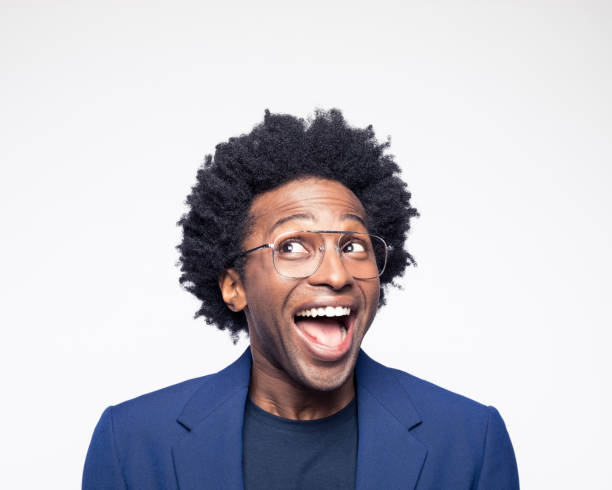 istock Excited man looking up and laughing 1416957121