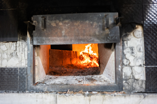 Woods Burning with in Front of the Stone Walls, Traditional Baking Oven