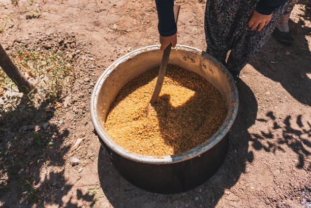 istock Traditional for Turkish,Wheat boiled in a cauldron for the making keskek 1416957669