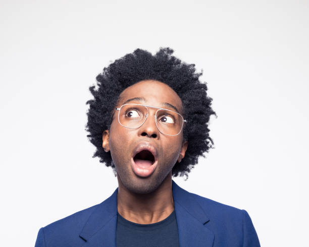 istock Shocked man looking up with mouth open 1416957730