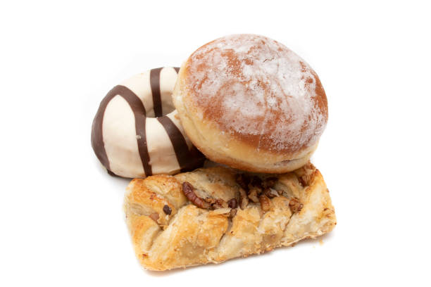 istock Donut, berliner (german doughnut) and sweet twisted puff pastry, isolated on white background. 1416968865