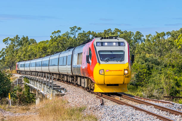 queensland rail's "spirit of queensland" near townsville. - railway bridge imagens e fotografias de stock