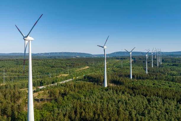 istock Wind turbines and forest - aerial view 1416969176