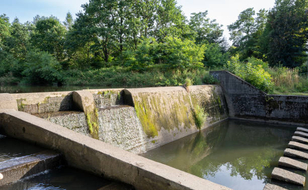 istock Dam on the river of concrete. 1416980880