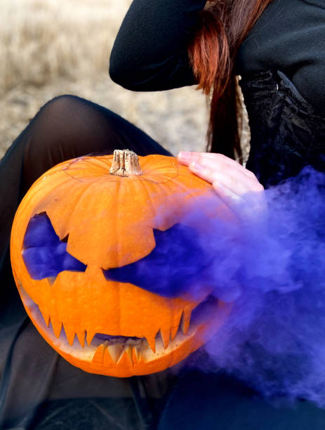 istock Halloween pumpkin with smoke 1416983135