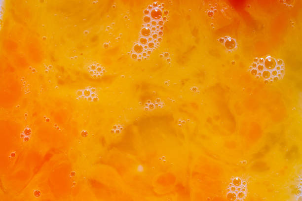 istock yolk texture,Egg yolks close-up. Background from egg yolks. 1416993931
