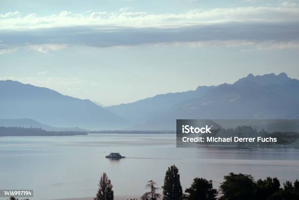 Car Ferry Between Cities Of Horgen And Meilen On Lake Zürich O A Blue Cloudy Summer Morning Stock Photo - Download Image Now