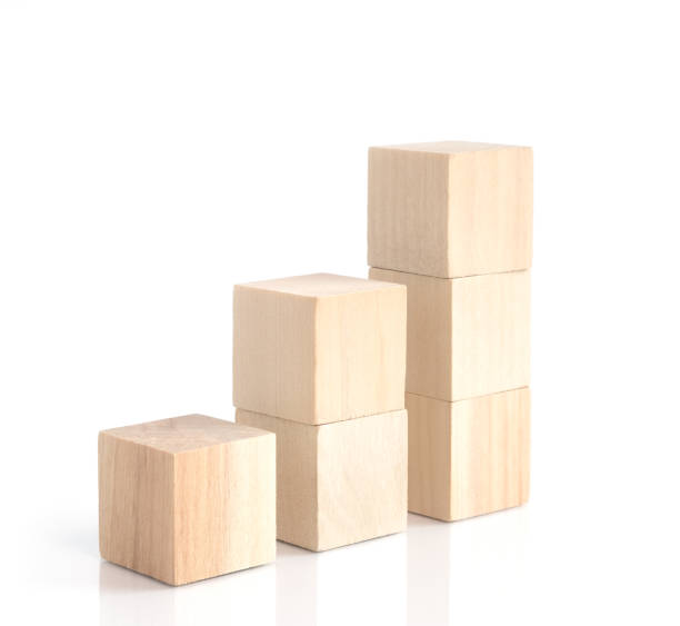 istock Business concept growth success process, statistics graph. Wooden blocks stacking as an arrow up averages as a growth graph chart on white background. 1416999420