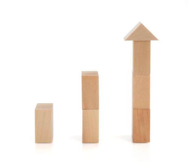 istock Business concept growth success process, statistics graph. Wooden blocks stacking as an arrow up averages as a growth graph chart on white background. 1416999431