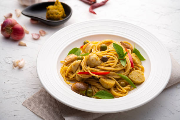 istock Spaghetti with Green Curry Sauce and fish ball 1417001370