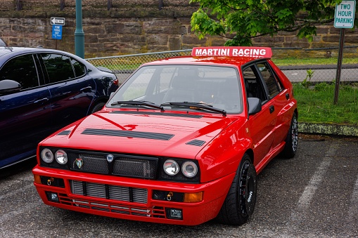 A red Lancia Delta Integrale under Martini Racing in Milford Cars & Coffe Event, Milford, Connecticut