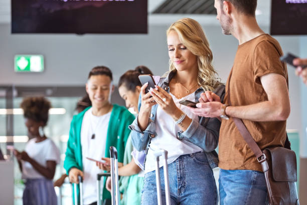 istock Woman using smart phone by boyfriend 1417006417