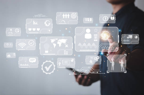 istock Business people using virtual interfaces via smartphones 1417007020