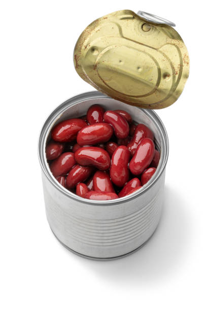 istock Open tin can with preserved kidney beans on white background 1417009799