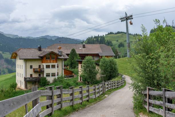 istock Ropeway over rural houses with green mountains 1417011877