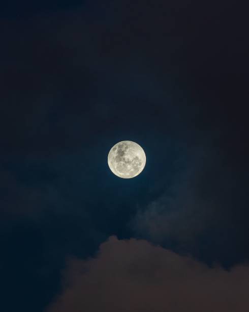 istock Vertical shot of a beautiful full moon in the sky 1417018533