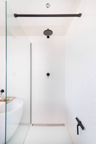 istock Vertical shot of an empty bathroom. Minimalist interior design. 1417018779