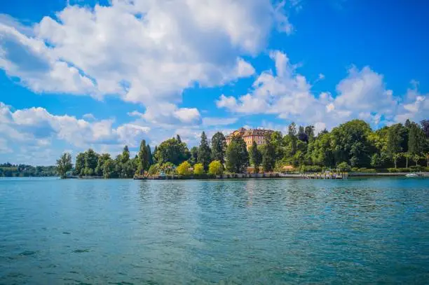 A beautiful view of the Lake Constance with Mainau Island in the background on a sunny day, Germany