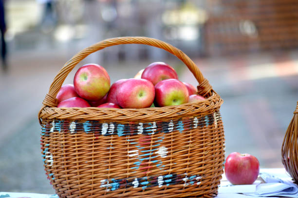 Organically produced apples in baskets on a farmer's market