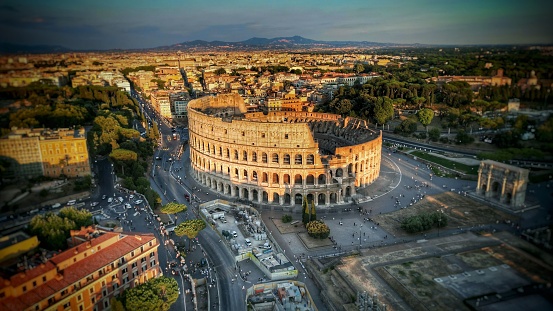 An aerial view of a Colosseum in a beautiful Rome, Italy