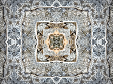 A beautiful symmetrical pattern formed by overlapping and intersecting natural and stone textures, for backgrounds, wallpapers and tiles