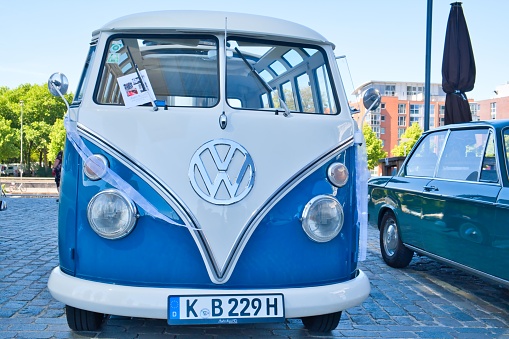 VW T1 Bus or Bulli called two-tone, produced from 1950-1967 at the oldtimer exhibition in Cologne, front view