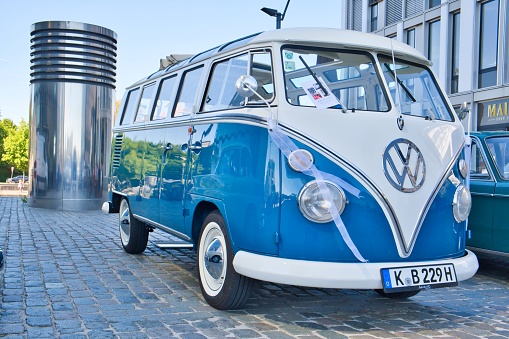 VW T1 Bus or also called Bulli two-tone, produced from 1950-1967 at the oldtimer exhibition in Cologne, diagonal front view