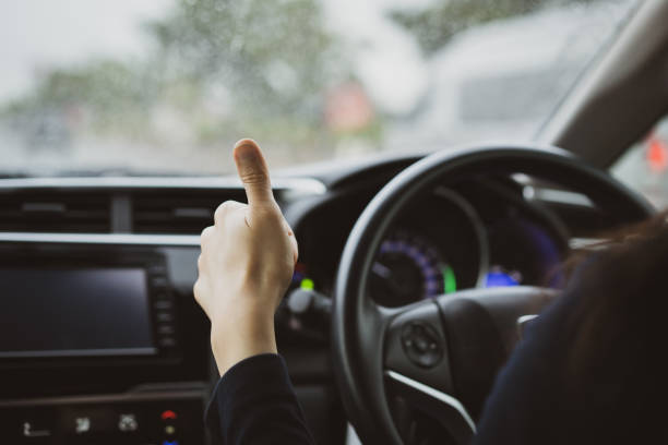 istock Woman driving in the rain. 1417038671