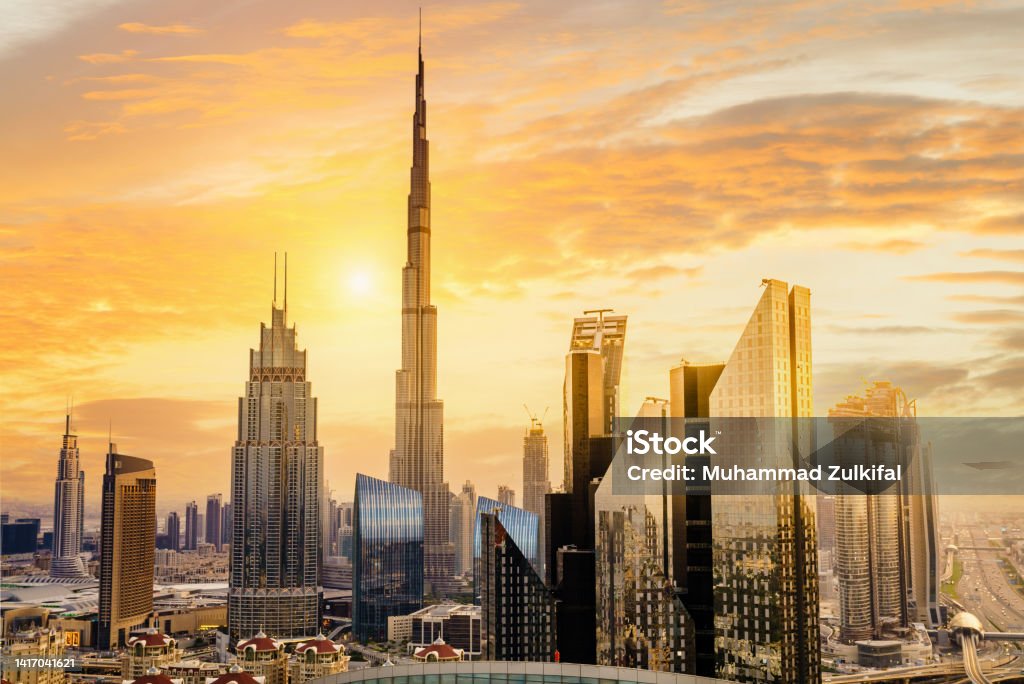 View of Dubai downtown Skyline at sunset. Dubai at sunrise. Dubai - amazing city skyline with luxury skyscrapers at sunset, United Arab Emirates. Dubai Stock Photo