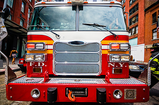 Close up front view of a Fire Department New York fire engine on a New York city street
