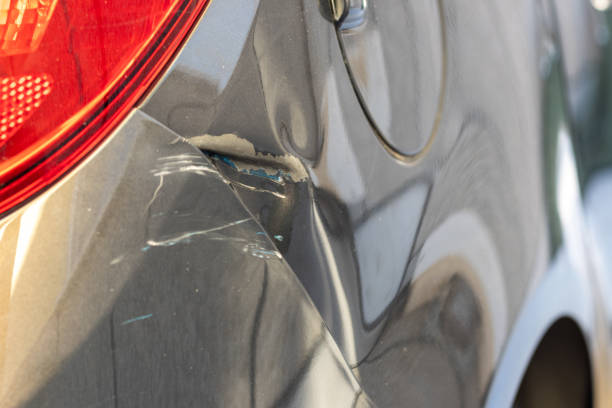 istock Minor damage and dent on the car body 1417045487
