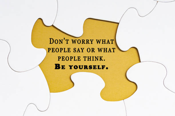 istock Motivational quote on jigsaw puzzle with some missing pieces. 1417046438