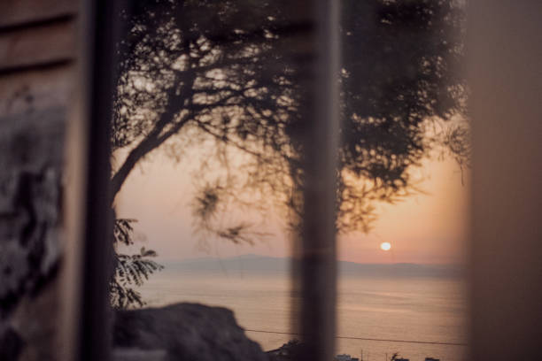 istock Sunset reflections on a window in the morning 1417055493