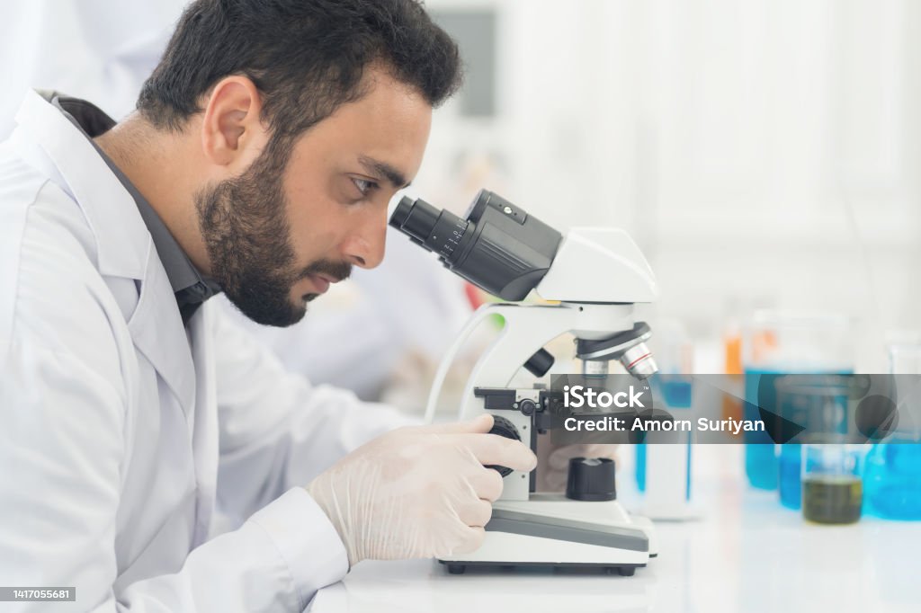 Lab Germs Test Image Man Scientist Looking Through Microscope Doing Analysis For Germs And ...