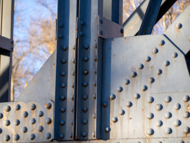 istock rivet in old metal structure of a bridge. Engineering concept 1417058907
