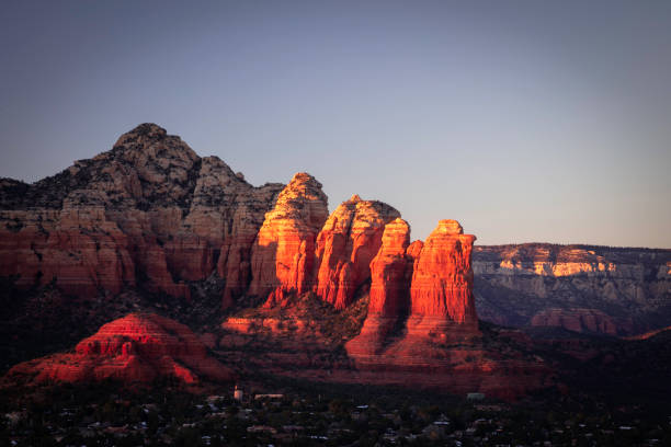 Coffee Post Formation near Wilson Mountain and suburbs of West Sedona Arizona photographed at Sunset.