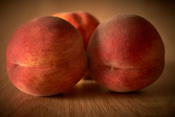 peaches are on the table in the kitchen