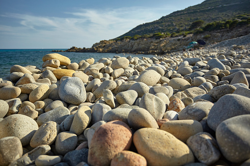 Sardinian beach in Italy with the background of the sea and of the whole of this marvelous natural and uncontaminated beach.