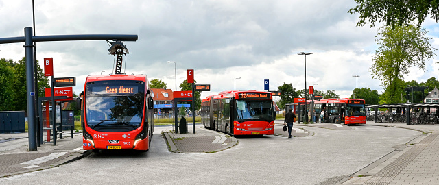 Ede, The Netherlands - March 1, 2024: Bus leaving from new Ede-Wageningen Central Station immediately after the opening.