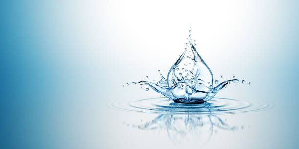 water drop splash. on the blue background. - water splashing spray drop imagens e fotografias de stock