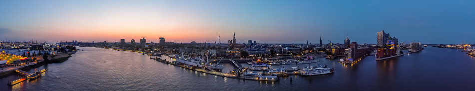 A Panoramic view of the Amsterdam Skyline, facing the south direction, featuring the canals, Westerkerk, Royal Palace and the Church of Saint Nicholas
