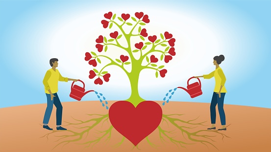 Watering the tree of love. Tree with big hearth and growing hearts on branches. Man and woman watering the relation. Dimension 16:9.