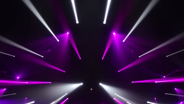 Stage Ray Of Light In Concert Hall. Professional lighting and show effects.