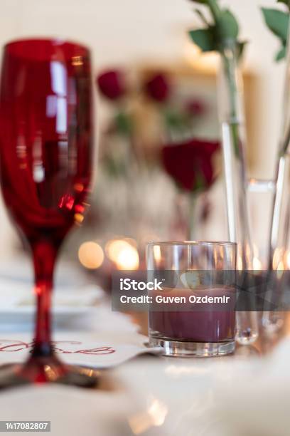 Valentines Themed Serving Plate And Napkin Holder Closeup Video Of Dinner Table With Empty Heart And Roses Slow Motion Video Of Empty Valentines Table During The Pandemic Dinner Table Service Serving Cutlery And Plates At The Dinner Table Stock Photo - Download Image Now