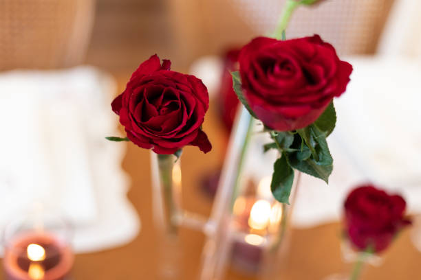 istock Valentine's themed serving plate and napkin holder, Close-up Video of Dinner Table with Empty Heart and Roses, Slow motion video of empty valentine's table during the Pandemic, dinner table service, serving cutlery and plates at the dinner table 1417082809