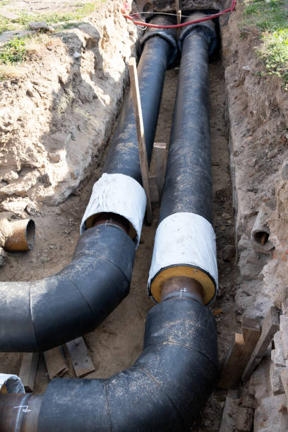 istock Large water and sewer a new tube pipe at construction site, stacked pvc plastic pipe. Engineering communication system construction. 1417083975
