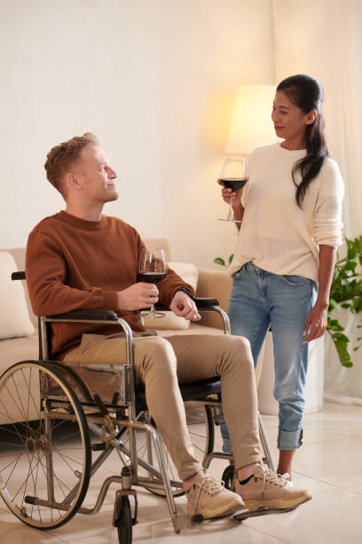 istock Happy Couple Drinking Wine at Home 1417084817