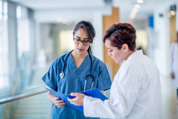 istock Female Doctors Discussing a Patient Treatment Plan 1417084904