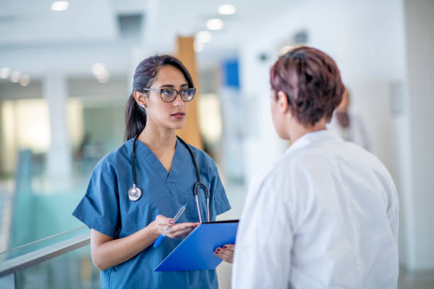 istock Female Doctors Discussing a Patient Treatment Plan 1417084909