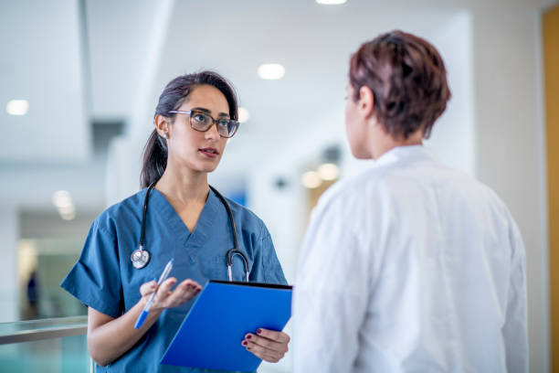 istock Female Doctors Discussing a Patient Treatment Plan 1417084920